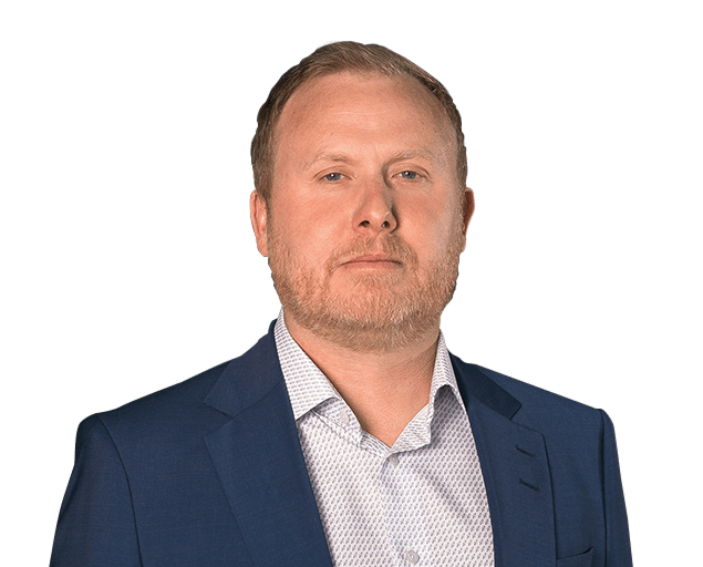 Jonas Brundin med blå kavaj och vit skjorta.